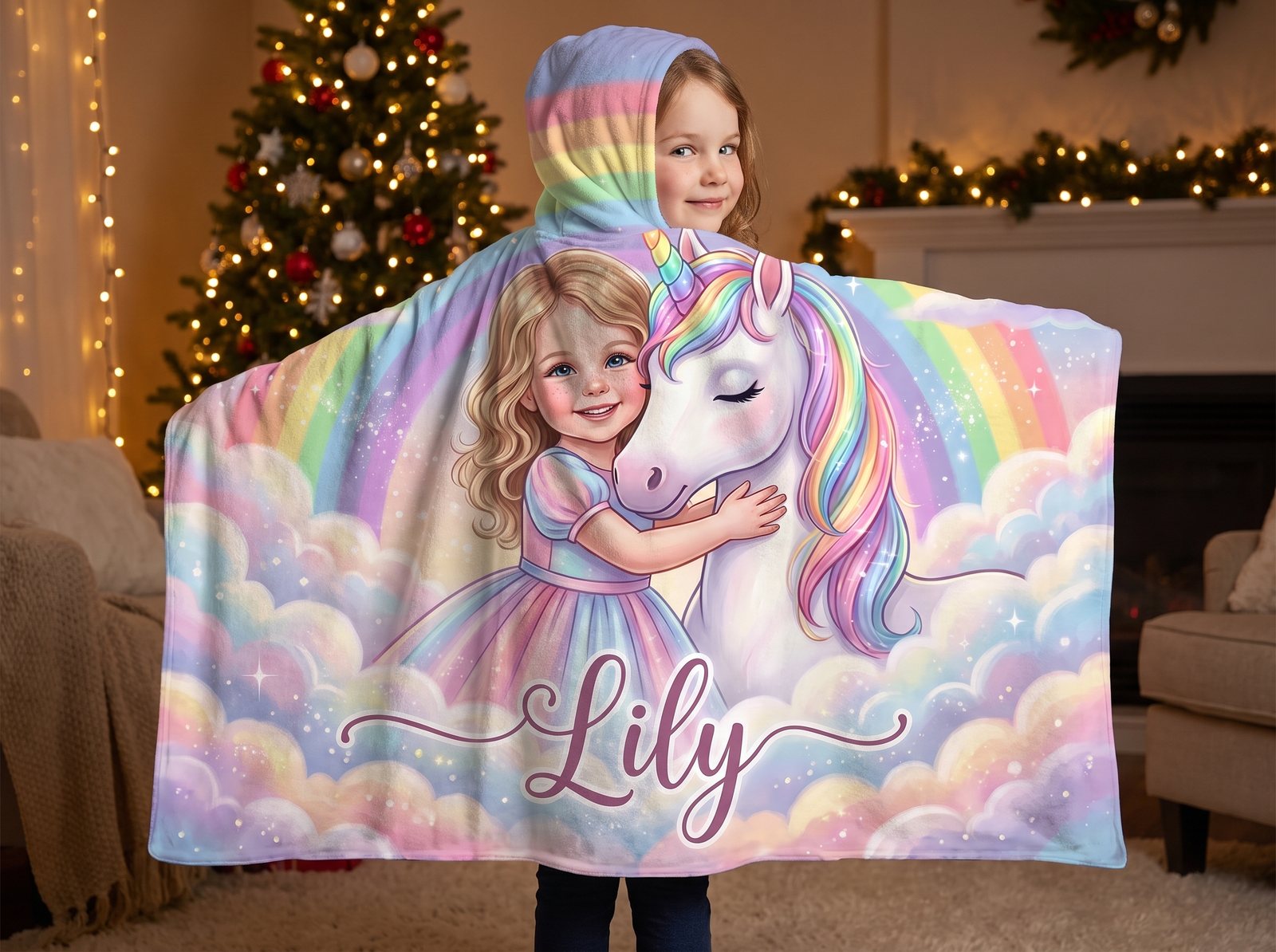 Lily wrapped in her personalized MyStoryWear unicorn hooded blanket by the Christmas tree